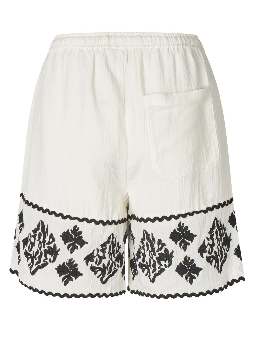 Achterkant product foto mbyM short Habr-m zwarte details en beige van kleur