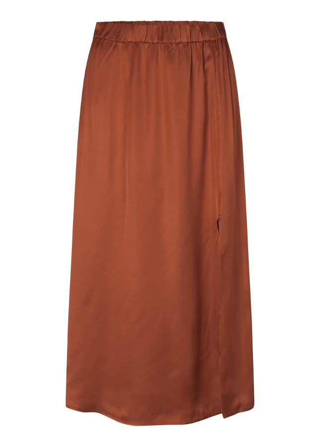 Maple satijnlook rok Flore van het merk Modstrom. De satijnen midi-rok heeft een split aan de voorkant. De Flore rok is halflang en hoog getailleerd met elastische taille. Shop de nieuwe collectie Modstrom kleding. Midi-rokken, Satijnlook rokken, roestbruine rokken, Modstrom rokken shop je online bij Boetiek Aniek.