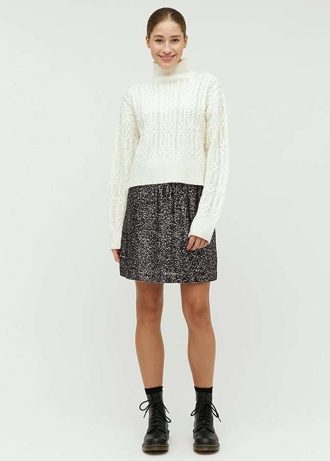 Minirok met pailletten van het merk mbyM. De korte zwarte rok heeft een elastische tailleband, pailletten en een mini lengte. Combineer de rok met een fijne gebreide trui voor een casual chique look of combineer de rok met de bijpassende zwarte paillettentop. Shop zwarte en blauwe pailletten rokken bij Boetiek Aniek.